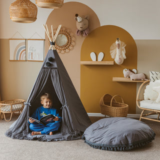 boho style reading nook with floor pillow