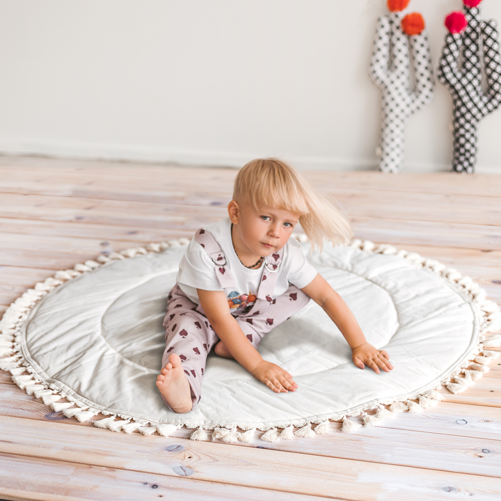 MINICAMP Padded Kids Play Mat in Ecru with Tassels Minicamp